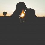 Romantic Quotes couple at sunset