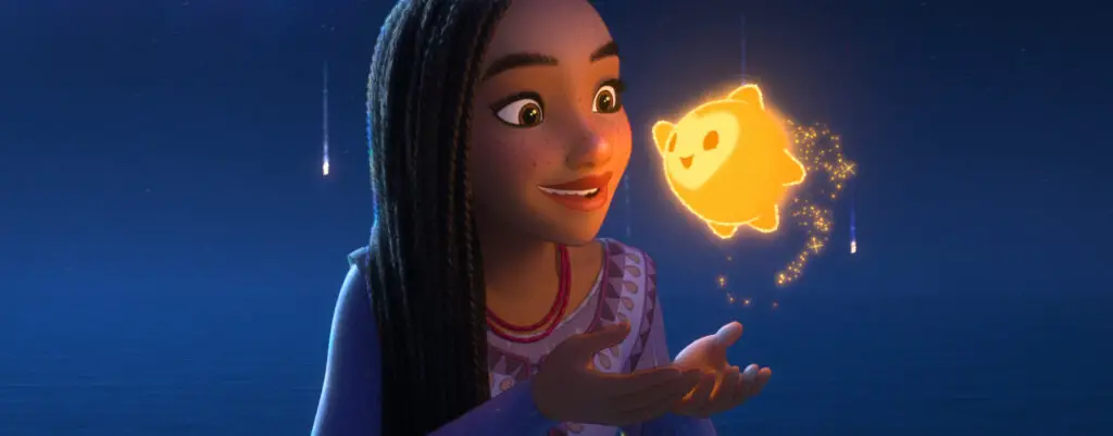 film still of girl holding star